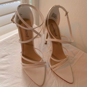 White strappy high heels